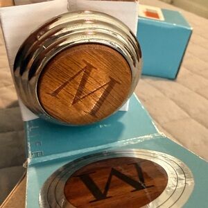 NWT. Nambe Alto wine stopper - M. 
2 available.